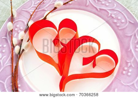 Two Paper Red Hearts With Willow Twig On Porcelain Plate.