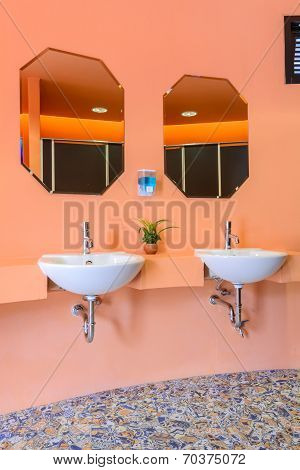 Handbasin And Mirror In Toilet