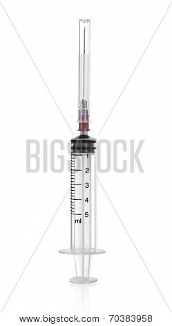 A 5ml syringe and needle isolated on a white background with detailed clipping path.