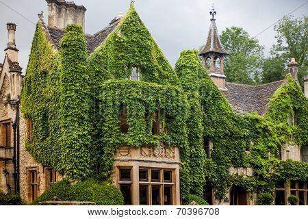 WILTSHIRE, CHIPPENHAM, UK - AUGUST 9, 2014: Castle Combe mansion and golf club