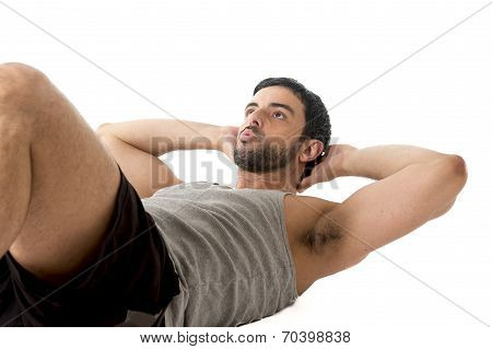 Attractive Latin Sport Man Wearing Running Clothes Doing  Sit Up Or Crunch