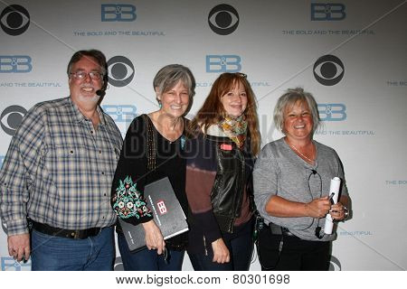 LOS ANGELES - JAN 14:  Doug Hayden, Deveney Kelly, Director, Laura Yale as the  Bold and Beautiful Celebrates 7000th Show at a CBS Television City on January 14, 2015 in Los Angeles, CA
