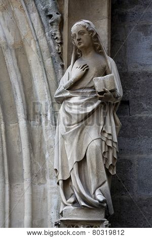 VIENNA, AUSTRIA - OCTOBER 11: Statue of Saint, facade of Minoriten kirche in Vienna, Austria on October 11, 2014.