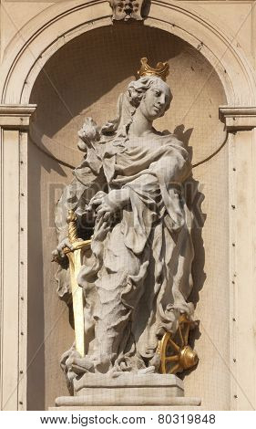 VIENNA, AUSTRIA - OCTOBER 10: Saint Catherine of Alexandria on baroque Jesuits church. The church was built between 1623 and 1627. in Vienna, Austria on October 10, 2014.