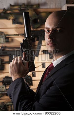 Bald Hitman With The Gun