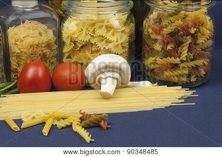 Various types of pasta on the table, homemade food preparation