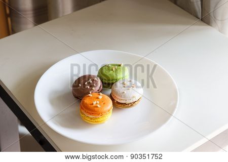 Orange, White, Brown Green Magaroon