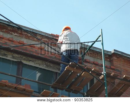 Workpeople On Ledge