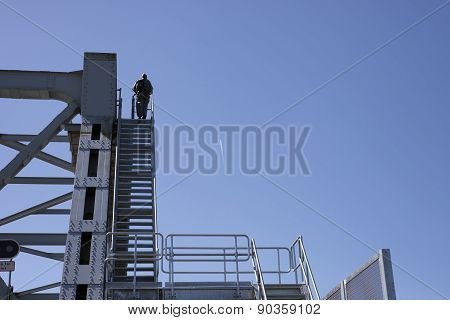 Walker On Bridge Top