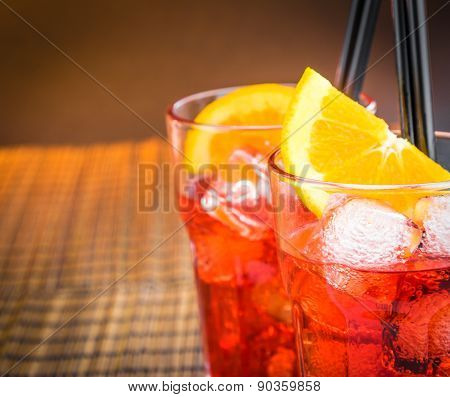 Top Of View Of Spritz Aperitif Aperol Cocktail With Two Orange Slices And Ice Cubes