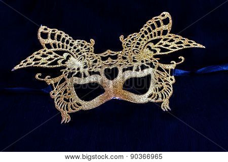golden carnival mask isolated on a black background