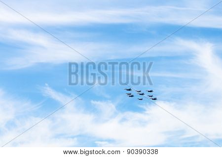 Military Low-flying Aircrafts In White Clouds