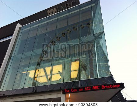 BRISBANE, AUSTRALIA - FEBRUARY 2, 2012: Reflection of Brisbane wheel on ABC building in the afternoon