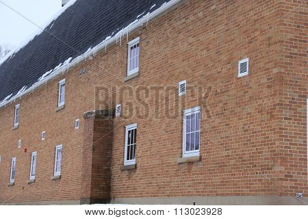 Old brick barn in winter