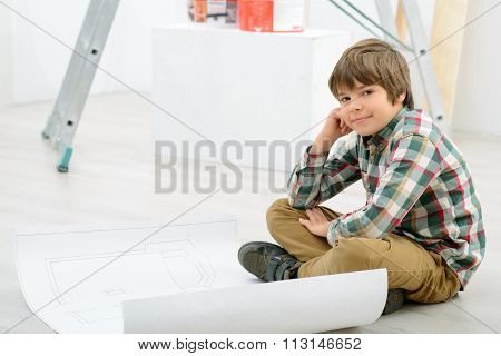 Little boy doing renovation