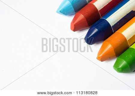 Close Up Of Used Crayoms Isolated On White
