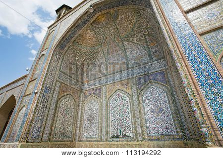 Historical Mosque With Tiled Walls And Persian Patterns In Iran