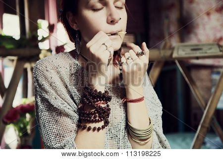 Young Girl Playing Mouth Harp