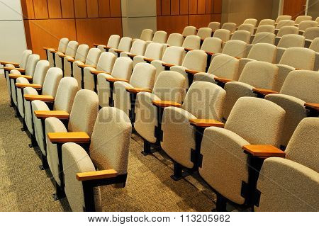rows of seats in college lecture hall