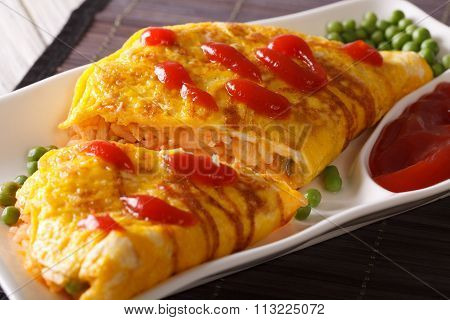 Japanese Omelet With Rice Omurice Close-up On A Plate. Horizontal