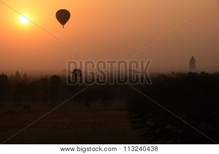 Hot-air balloon over Bagan during sunrise