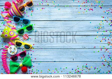 Colorful carnival background with party accessory, streamers and confetti