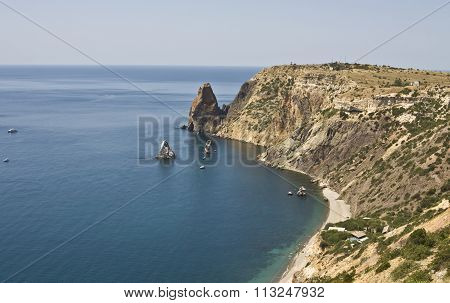 Sea landscape with rocks in water recorded in place Fiolent in region Crimea on Black sea.