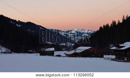 Pink Sky Over Wintery Landscape Near Gstaad