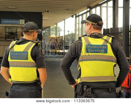 Protective Services officers at a train station