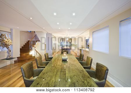Stylish Dining Room With Green Table