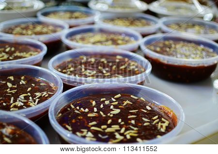Several Omani Halwa in plastic trays
