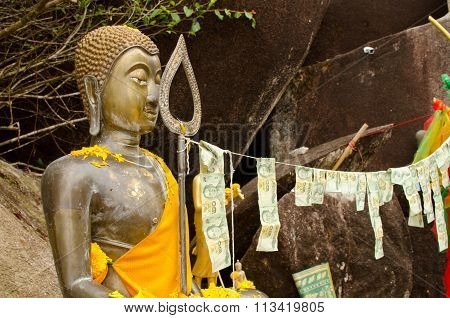 Buddhist Statue With Offerings