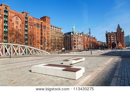 HAMBURG, GERMANY - MARCH 10: Speicherstadt with unidentified people on March 10, 2014 in Hamburg. The Speicherstadt in Hamburg is the largest timber-pile founded warehouse district in the world.