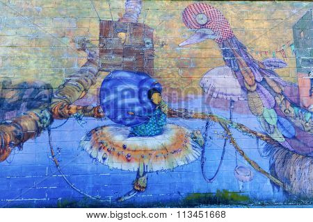 mural art of Os Gemeos in Coney Island, NYC