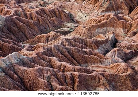Drought red orange sand stone rock formation in Tatacoa desert, Huila