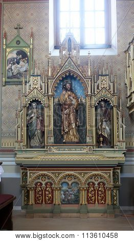 STITAR, CROATIA - AUGUST 27: Altar of the Sacred Heart of Jesus in the church of Saint Matthew in Stitar, Croatia on August 27, 2015