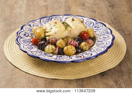 A Typical Portuguese Dish With Codfish Called Bacalhau Do Porto In A Original Portuguese Plate.