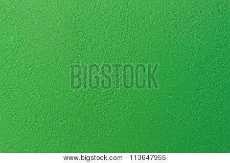 Green background of the wall.