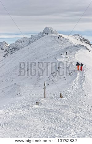People Climbing In Kasprowy Wierch Of Zakopane On Tatras In Winter