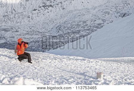 Woman Taking Photos Atop Of Kasprowy Wierch In Zakopane In Winter
