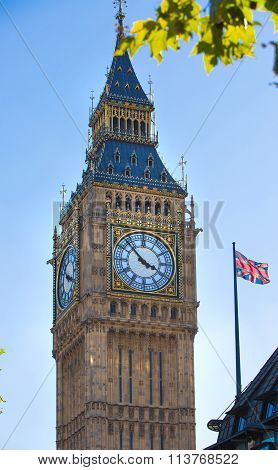 LONDON, UK - SEPTEMBER 10, 2015:  The Union Flag flying in front of the clock tower Big Ben, Palace