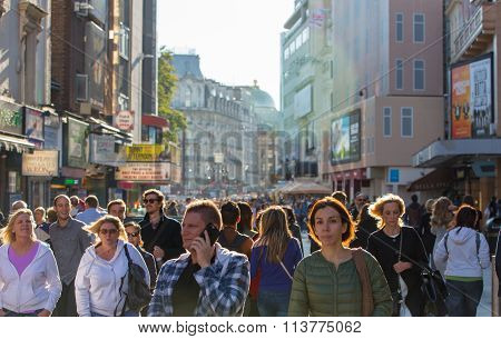 LONDON, UK - SEPTEMBER 10, 2015: Leisester square with lots of people, who spending evening time in