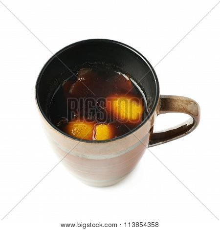 Glass mug filled with mulled wine isolated