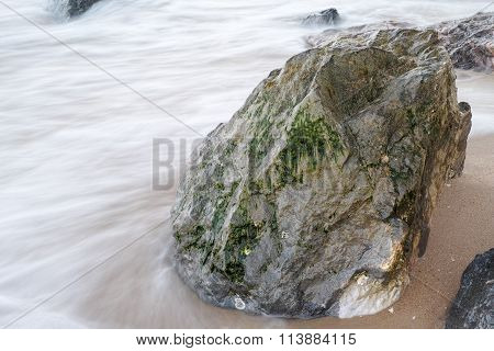 Flowing By The Rocks