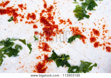 Indian raita prepared with curd, chili powder and vegetables