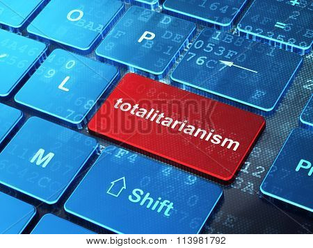 Politics concept: Totalitarianism on computer keyboard background