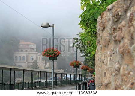 Montserrat, Spain - August 28, 2012: Misty Morning In The Benedictine Abbey Santa Maria De Montserra