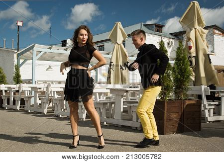 Couple Of Dancers Dancing Bachata On A City Street