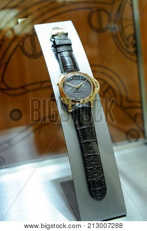 close up luxury gold wristwatch in luxury shop