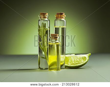 The lime oil on green studio background on table